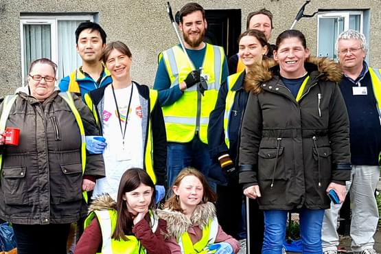 Local residents working together to clean up the neighbourhood as part of their Local Conversation project in Muirhouse, Edinburgh