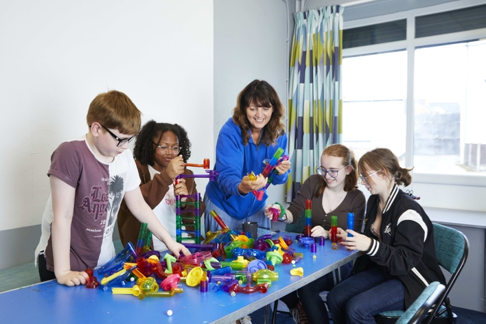 picture for projectStory: members of SNaP's after school club playing with toys