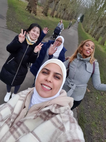 picture for projectStory: Four women pose for a selfie on a walk