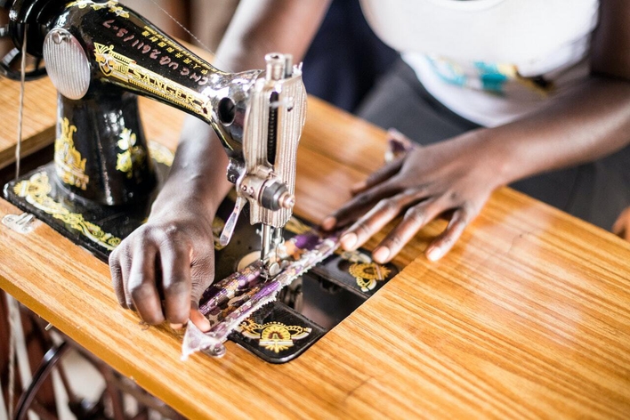 picture for projectStory: Image of hands using a sewing machine